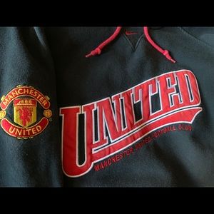 Nike Manchester United F.C. Men’s black hoodie.